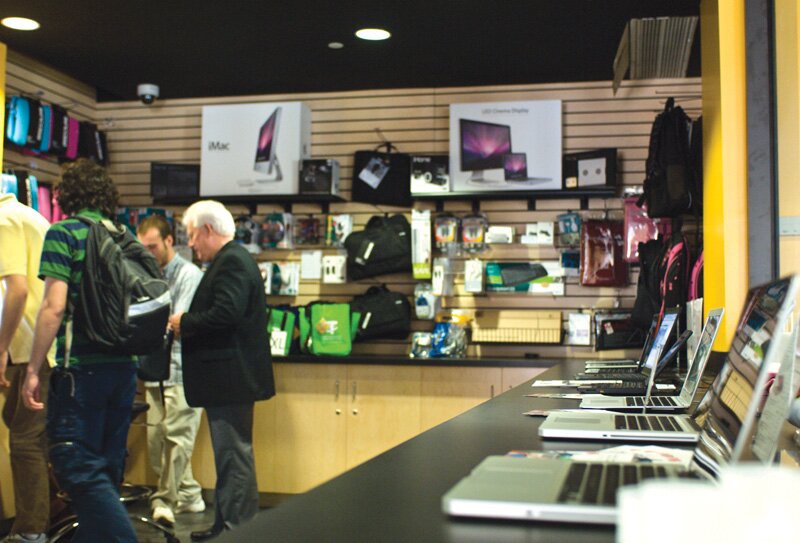 Students browse through the new store at its grand opening.